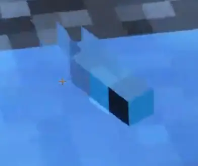 Blocky blue minnow swims in clear water