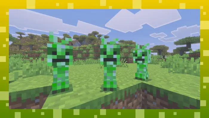 Three baby green mobs stand on grassy terrain.