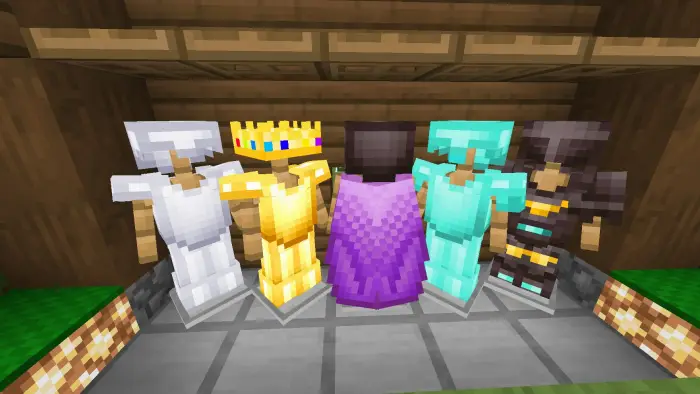 Five colorful armor sets on display stands.