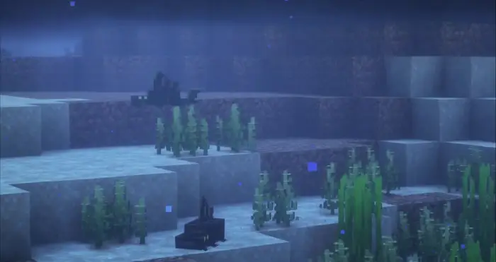 Pleco fish swimming near river plants