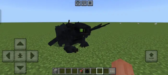 Night Fury dragon on grassy plain