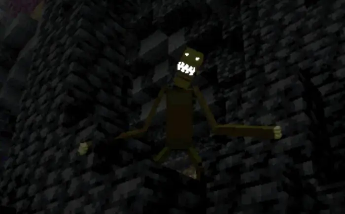 Blocky monster with glowing eyes in darkness