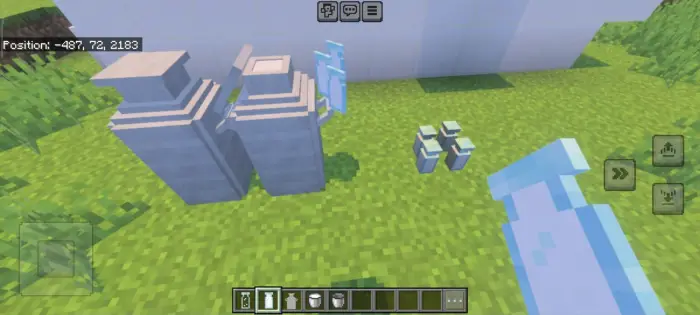 Glass jars and bottles placed on grass