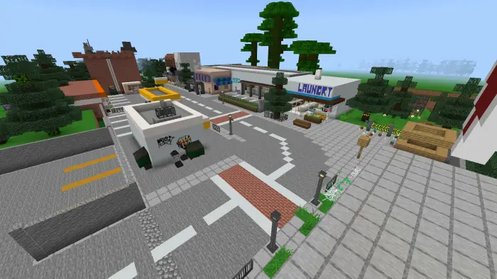 Blocky town with roads, trees, and buildings