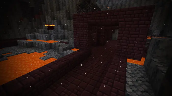 Dark fortress bridge over lava with snow.