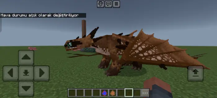 ALT Player stands near a large brown dragon