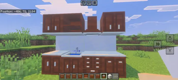 Wooden kitchen cabinets and sink outdoors