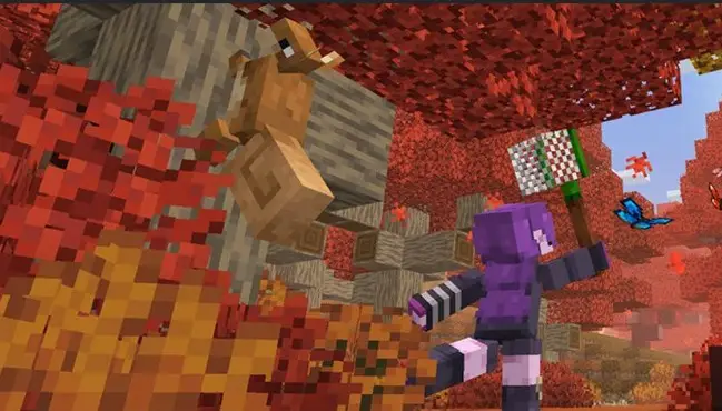 Player explores vibrant autumn forest biome.