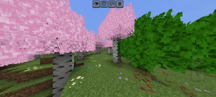 Bushy pink blossoms and lush green leaves