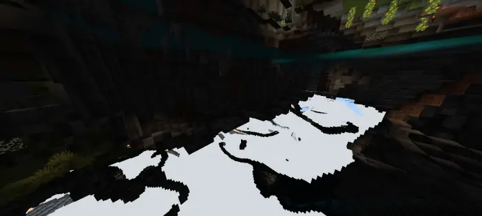 Glowing ores illuminate a dark cave.