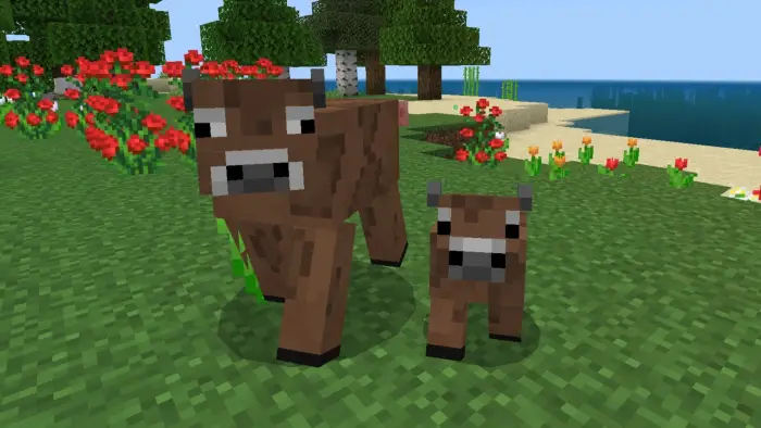 Blocky cow and calf on grassy terrain