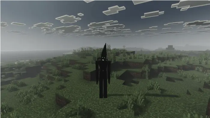 Dark creature stands in a foggy grassy field