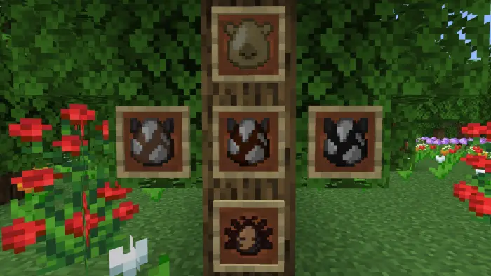 Five animal icons displayed on a tree trunk