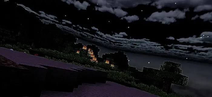 ALT Burning trees under a dark, cloudy sky