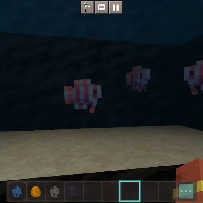Pixel fish swimming in a virtual aquarium.