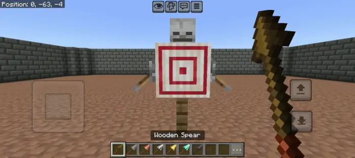 Minimalist wooden spear aimed at target