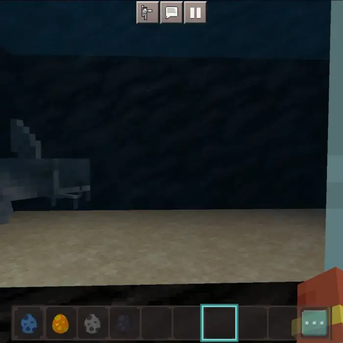 Pixelated fish swimming in an aquarium tank.