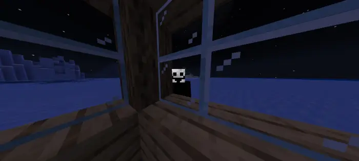 Mysterious figure peering through window at night