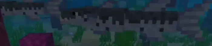 Pixelated barracuda fish swimming underwater