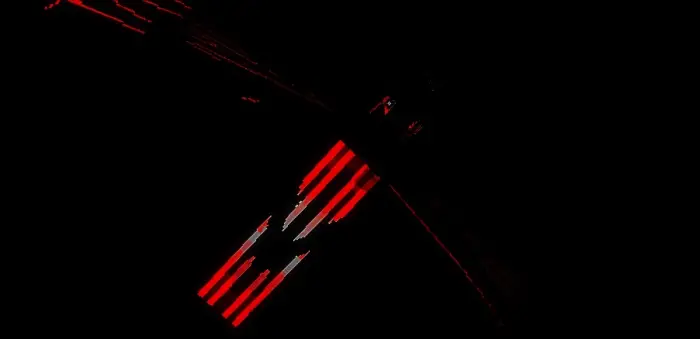 Red-lit hostile mob emerging from darkness