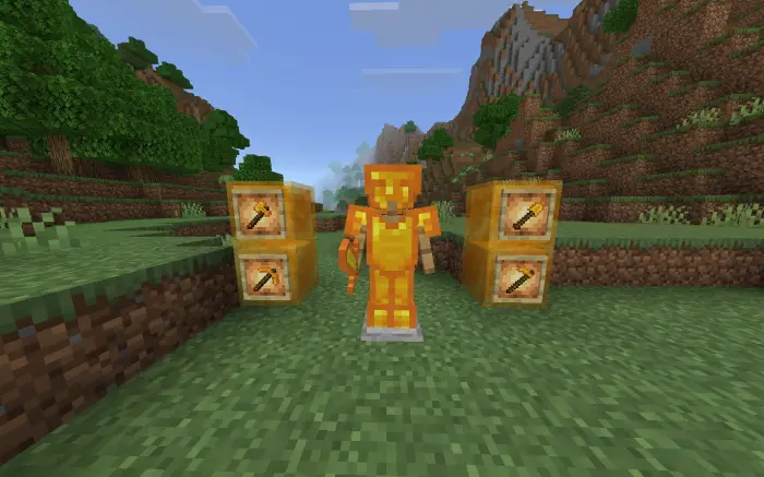 Golden armor and tools display on grass field