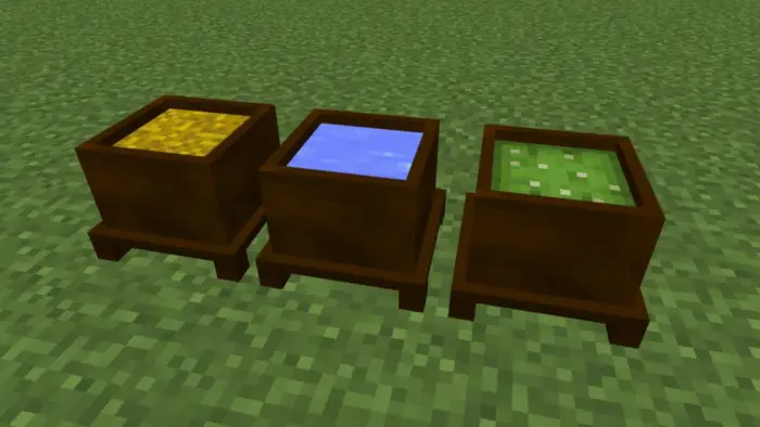 Three brown planters with different contents