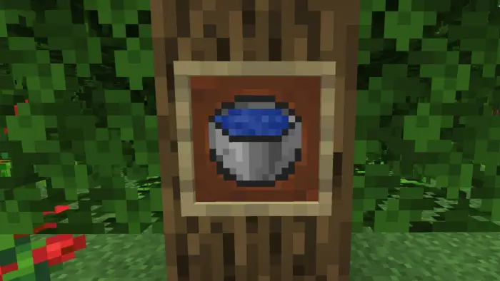 Pixelated bucket of water on tree trunk
