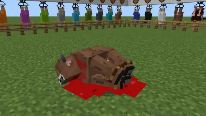 Slaughtered cow on grass with blood pool