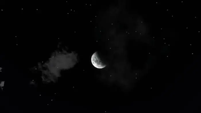 Half moon with clouds and scattered stars