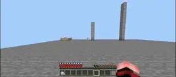 Player on flat terrain with tall stone pillars.
