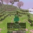 Player casting a spell in a lush landscape