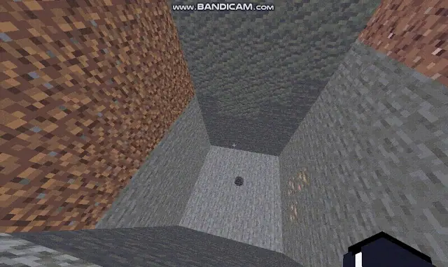 Deep quarry pit with exposed ores and stone