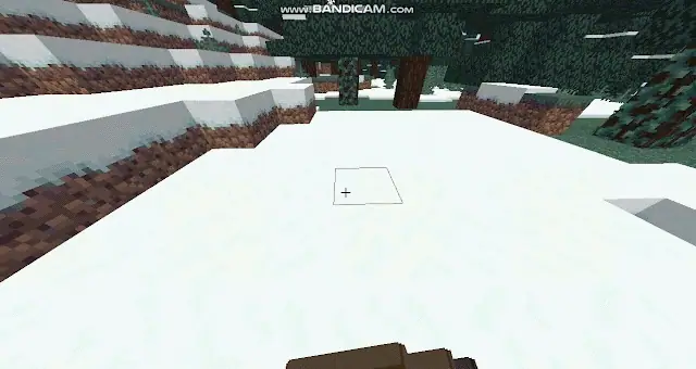 First-person view in a snowy forest clearing