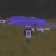 Player approaches glowing purple pool at night.