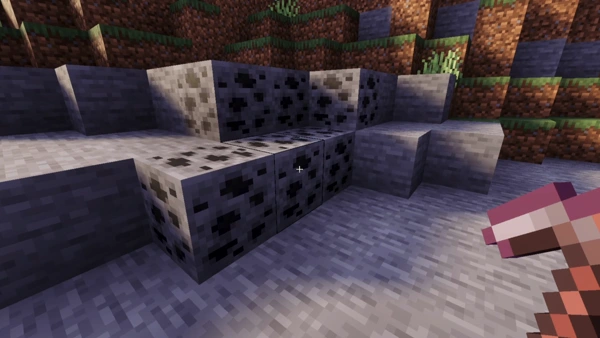 Player mining a coal ore vein with a pickaxe