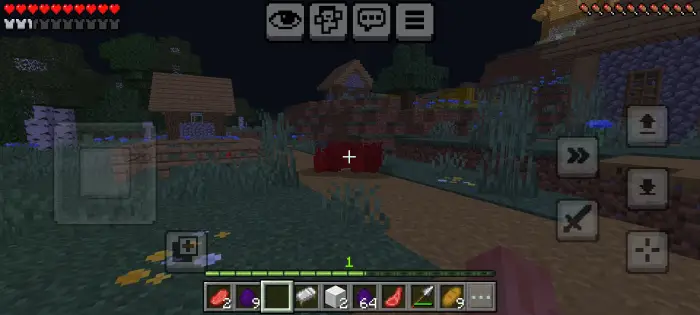 Red creature lurks in a dark village path