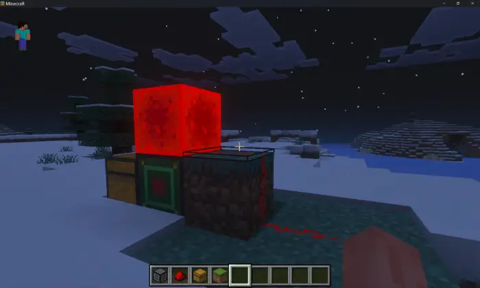 Redstone device and chests in snowy night.