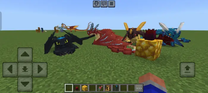 Group of colorful dragons resting on grass