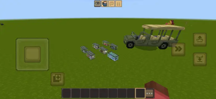 Safari jeep and animal cages on grass field