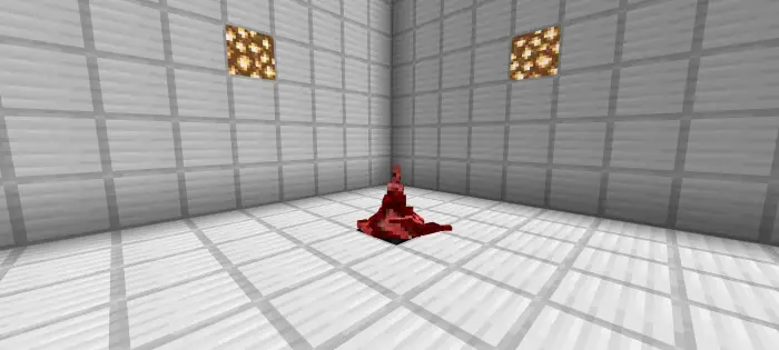 Red parasite mob in a white tiled room