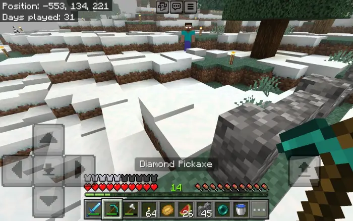 Player explores snowy terrain with a pickaxe.