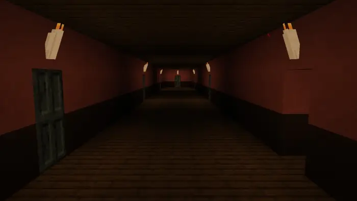 Dark, eerie hallway with dim wall lights