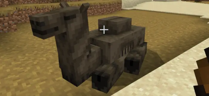 Blocky prehistoric animal statue in desert biome