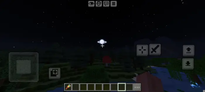 Saturn-like moon glowing in starry night sky