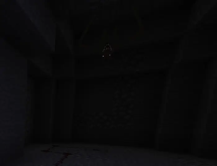 Dark cave with glowing eyes in the shadows.