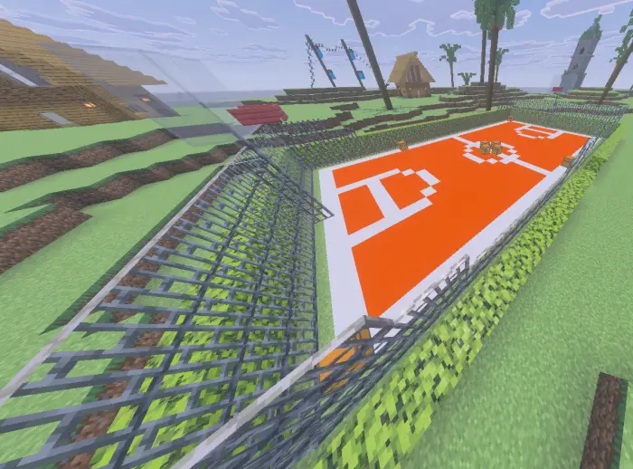Fenced orange sports court in blocky terrain