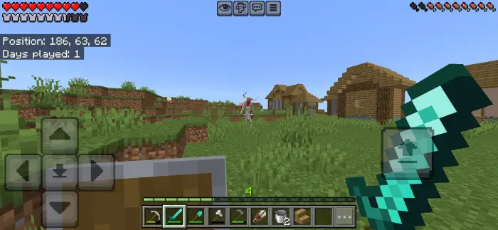 Player faces Goatman mob near village huts