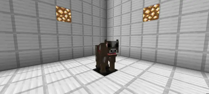 Blocky parasite creature in a white room