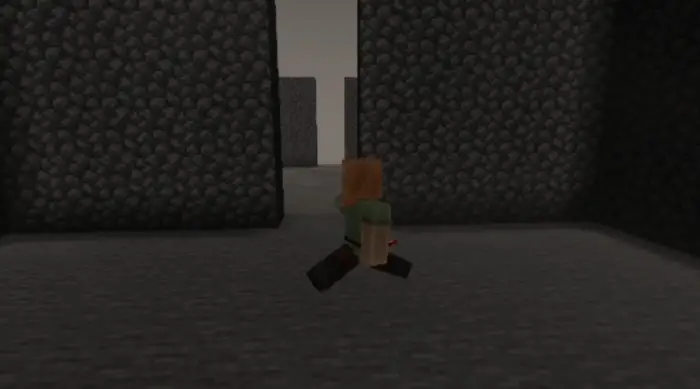 Player in a dark stone maze environment
