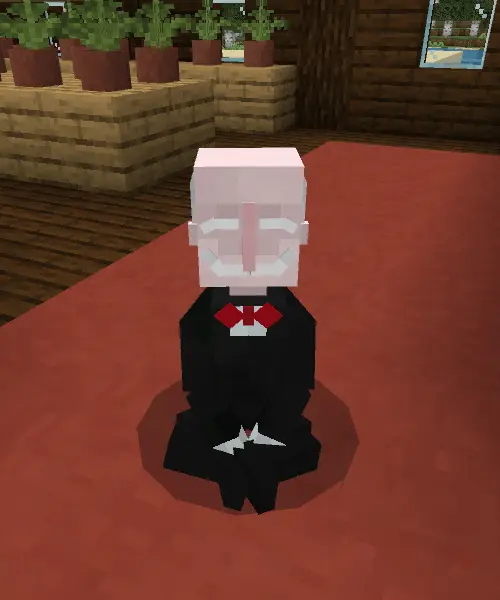 Blocky companion in a suit sitting indoors